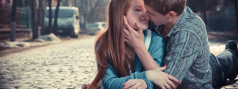 Couple Kissin Lying In Street