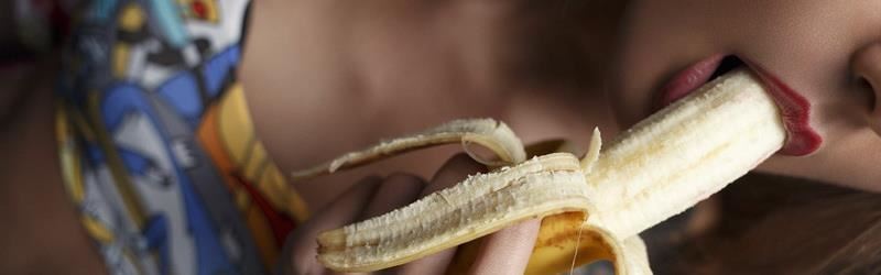 Girl Eating Banana